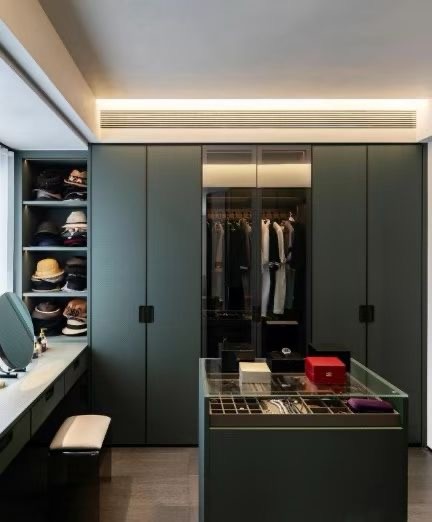 Dark green wardrobe supplied as an application reference